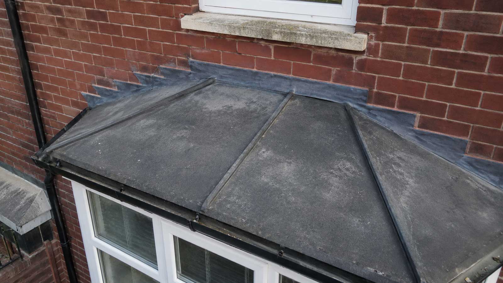 Roofing illustration for bay window roof repairs in wigan
